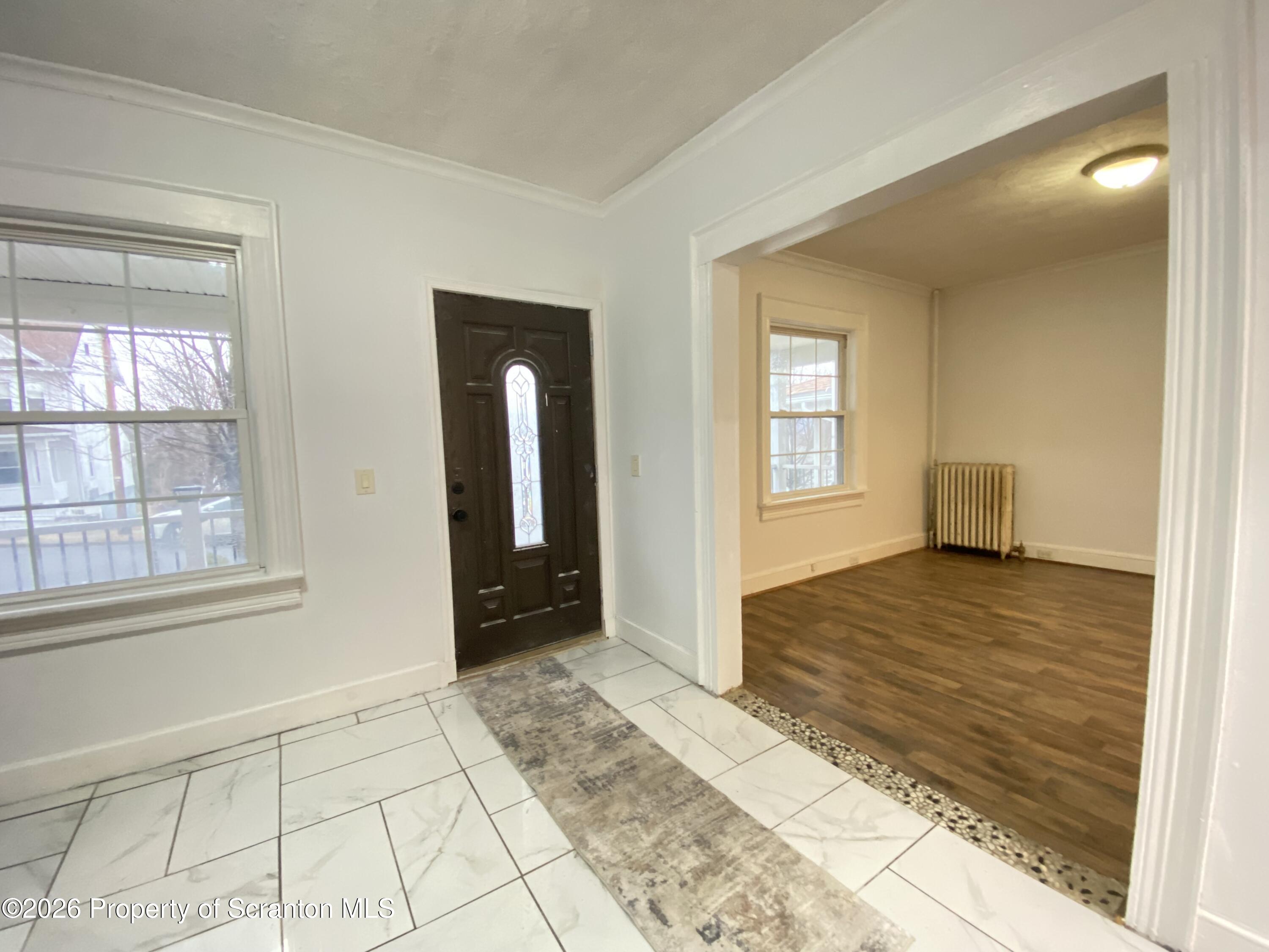 1827 Prospect Avenue Scranton, PA 18505 - Photo 5 of 48 a view of an empty room and window