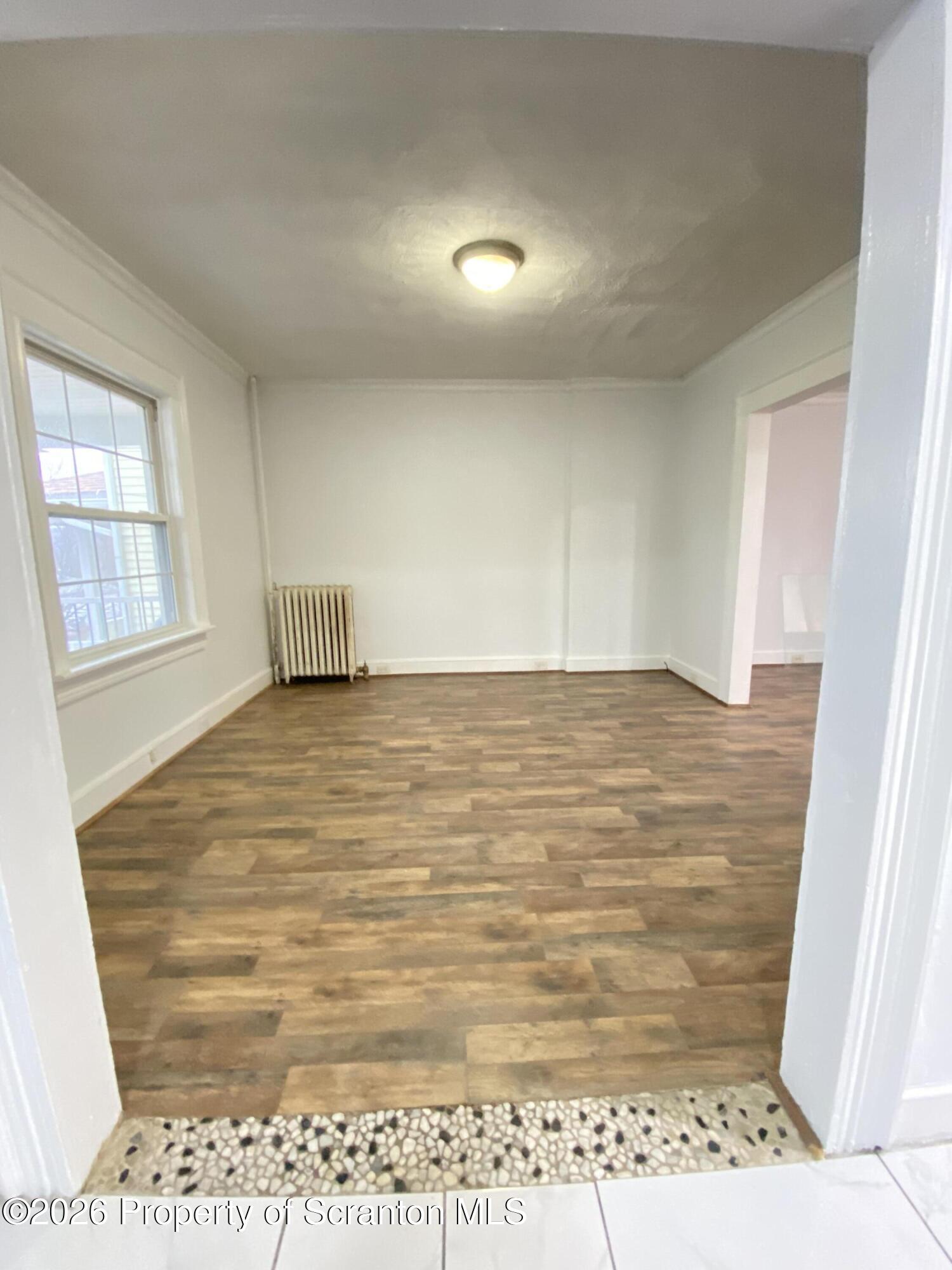 1827 Prospect Avenue Scranton, PA 18505 - Photo 6 of 48 a view of an empty room and window