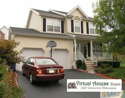 67 Springfield Road North Brunswick, NJ 08902 - Photo 1 of 8 a car parked in front of a house