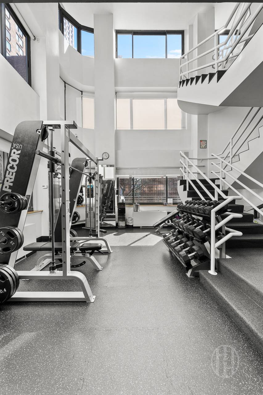 2000 Broadway, Unit 7H Manhattan, NY 10023 - Photo 10 of 13 a view of a room with gym equipment