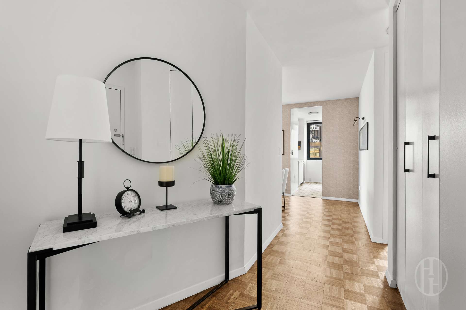 2000 Broadway, Unit 7H Manhattan, NY 10023 - Photo 7 of 13 a view of a room with a sink and a mirror