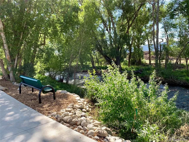 a view of a bench in a garden