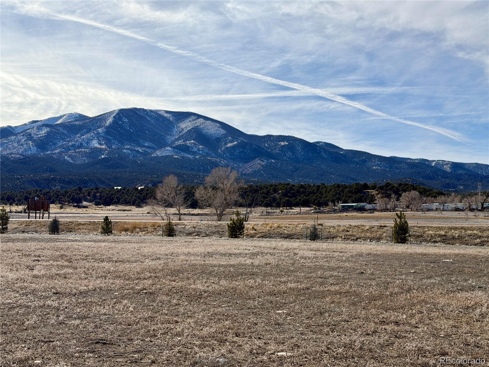 150 Southside Loop Salida, CO 81201 - Photo 3 of 12 a view of a mountain with a yard