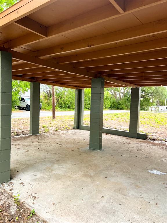 313 Ronald Street Cocoa, FL 32927 - Photo 2 of 3 a view of a room with a large window and front door