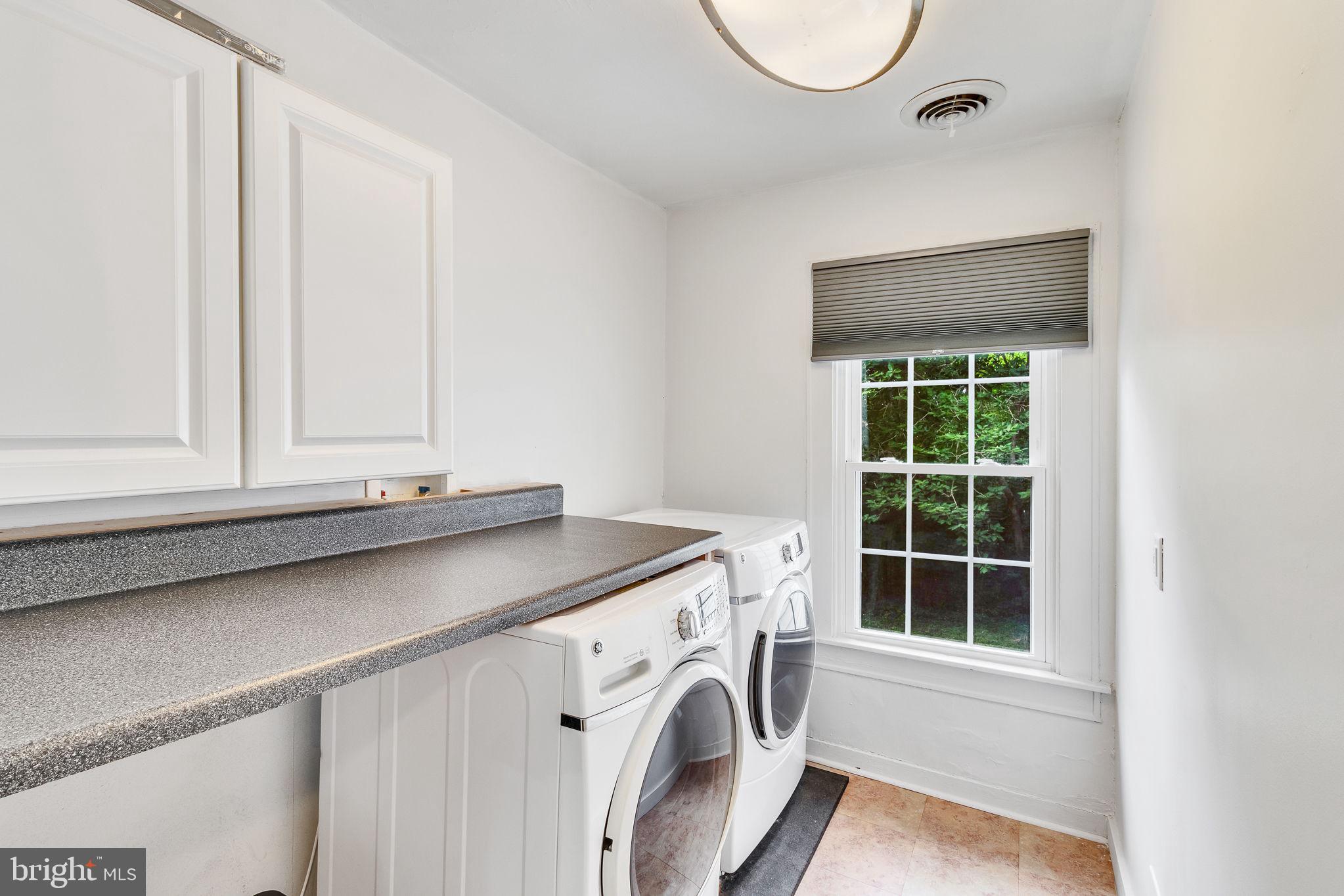 3952 Irvington Road Irvington, VA 22480 - Photo 38 of 77 a utility room with dryer and washer