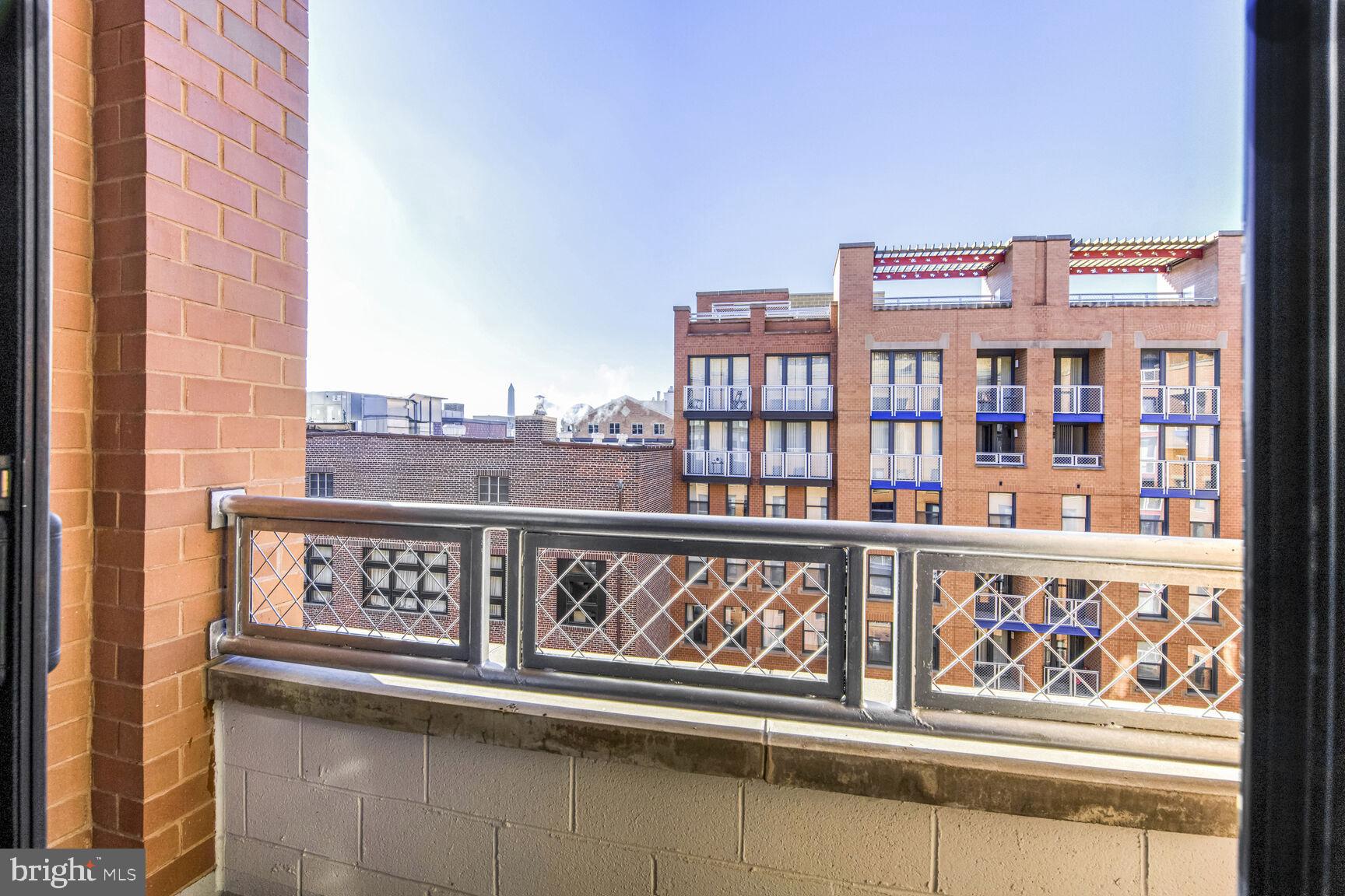 616 E Street Northwest, Unit 1150 Washington, DC 20004 - Photo 30 of 75 a view of a balcony and city view