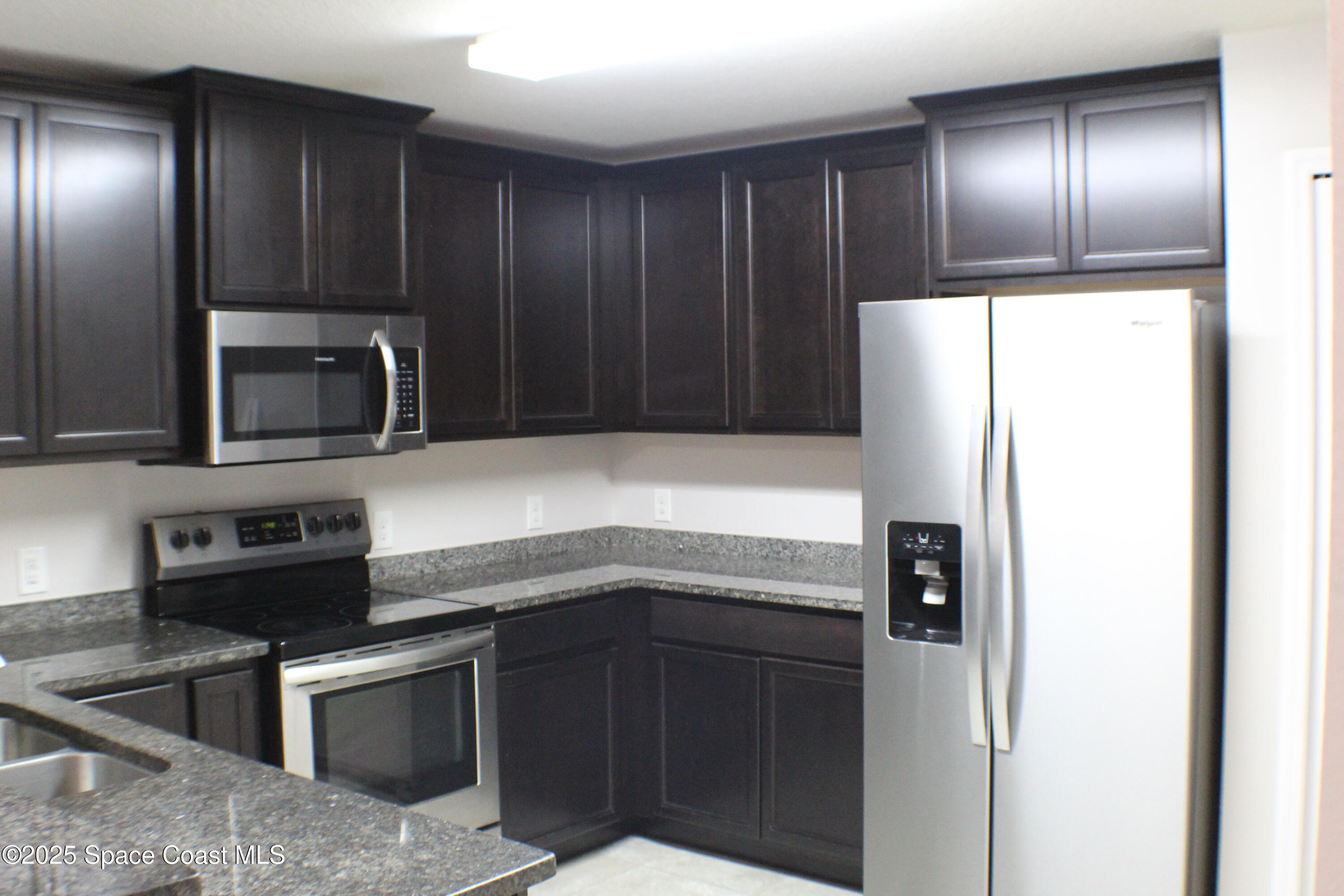 4027 Meander Place, Unit 208 Rockledge, FL 32955 - Photo 3 of 29 IMG_1224