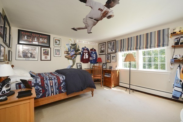 45 Falmouth Road Wellesley, MA 02481 - Photo 17 of 27 a bedroom with furniture and a window