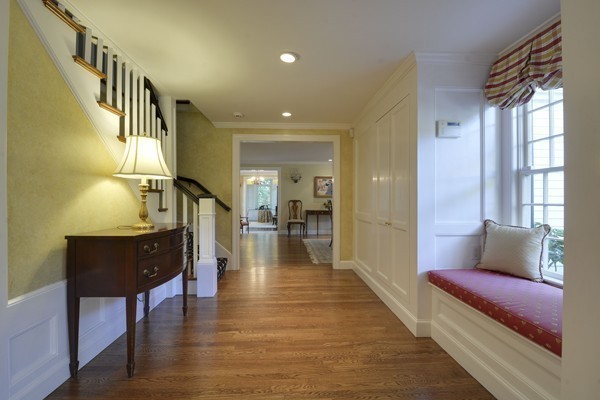 45 Falmouth Road Wellesley, MA 02481 - Photo 22 of 27 a living room with furniture and a table