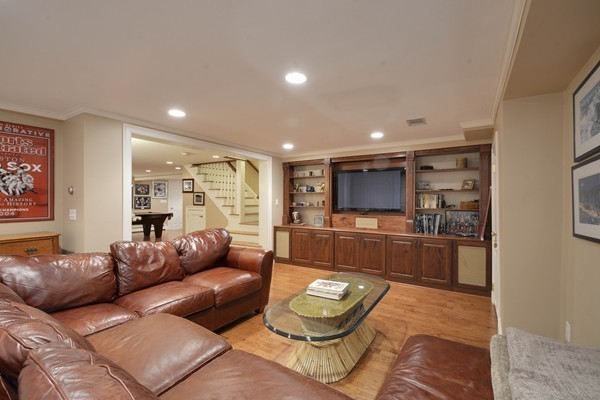 45 Falmouth Road Wellesley, MA 02481 - Photo 23 of 27 a living room with furniture and a large window