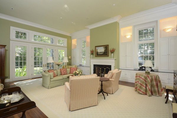 45 Falmouth Road Wellesley, MA 02481 - Photo 4 of 27 a living room with furniture large window and a fireplace