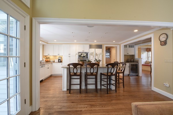 45 Falmouth Road Wellesley, MA 02481 - Photo 7 of 27 a view of a dining room with furniture and wooden floor
