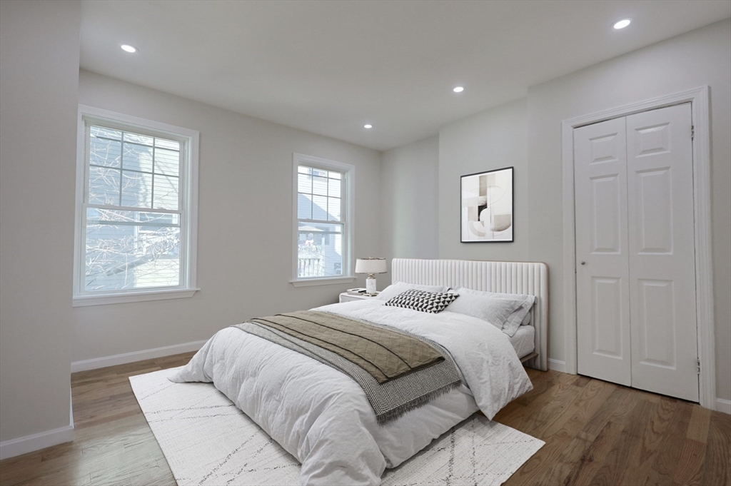 3 Appian Place Boston, MA 02128 - Photo 6 of 15 a bedroom with a bed and a window