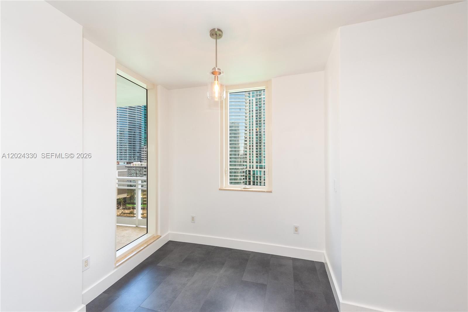 901 Brickell Key Boulevard, Unit 2006 Miami, FL 33131 - Photo 18 of 41 Space for a Dinette / 4 chairs - Natural Light