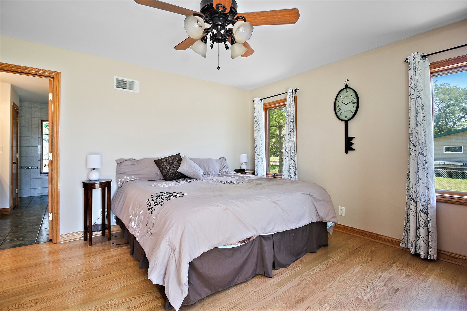 2068 East 7750S Road Chebanse, IL 60922 - Photo 12 of 24 a bedroom with a bed and wooden floor