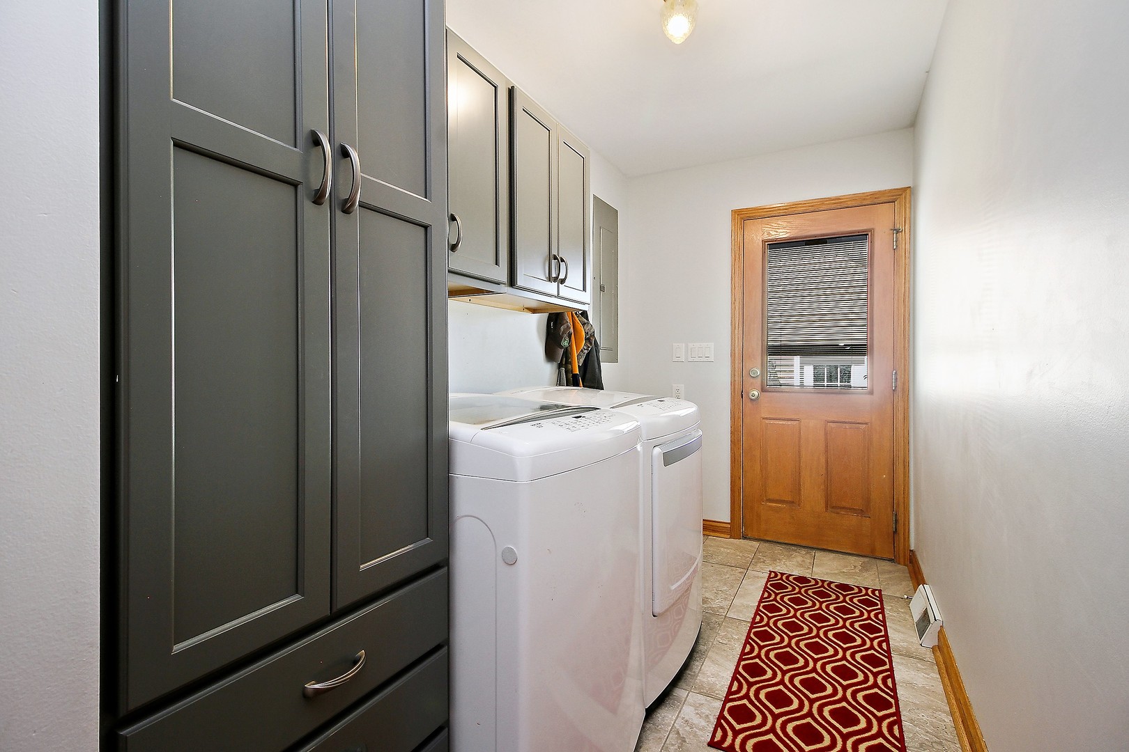 2068 East 7750S Road Chebanse, IL 60922 - Photo 19 of 24 a view of hallway with washer and dryer