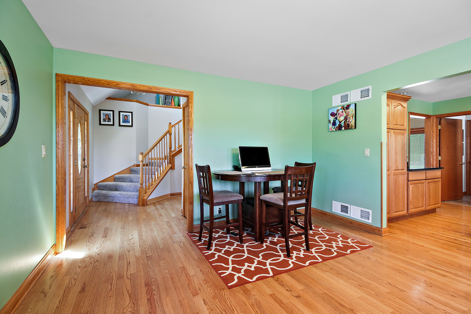 2068 East 7750S Road Chebanse, IL 60922 - Photo 6 of 24 a view of a dining room with furniture and wooden floor