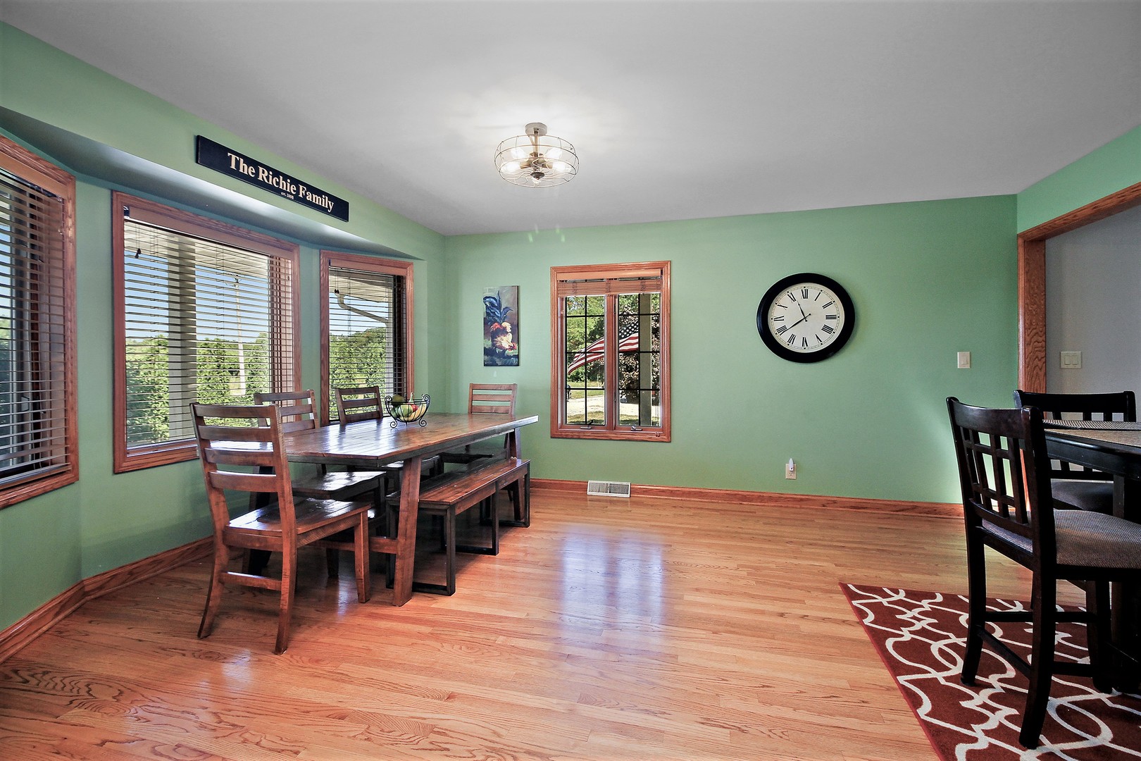 2068 East 7750S Road Chebanse, IL 60922 - Photo 7 of 24 a view of a dining room with furniture window and wooden floor