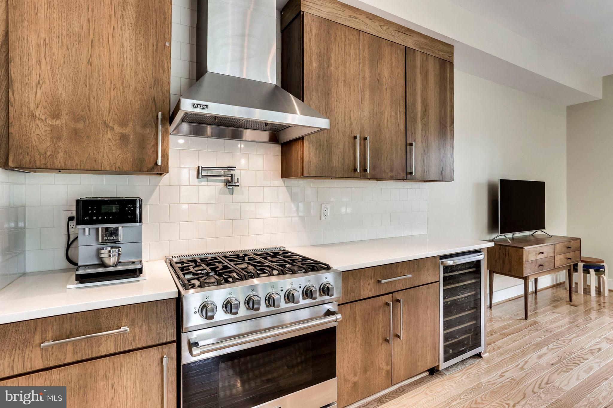 963 14th Street Southeast, Unit 1 Washington, DC 20003 - Photo 31 of 83 Kitchen with custom cabinets and Viking appliances