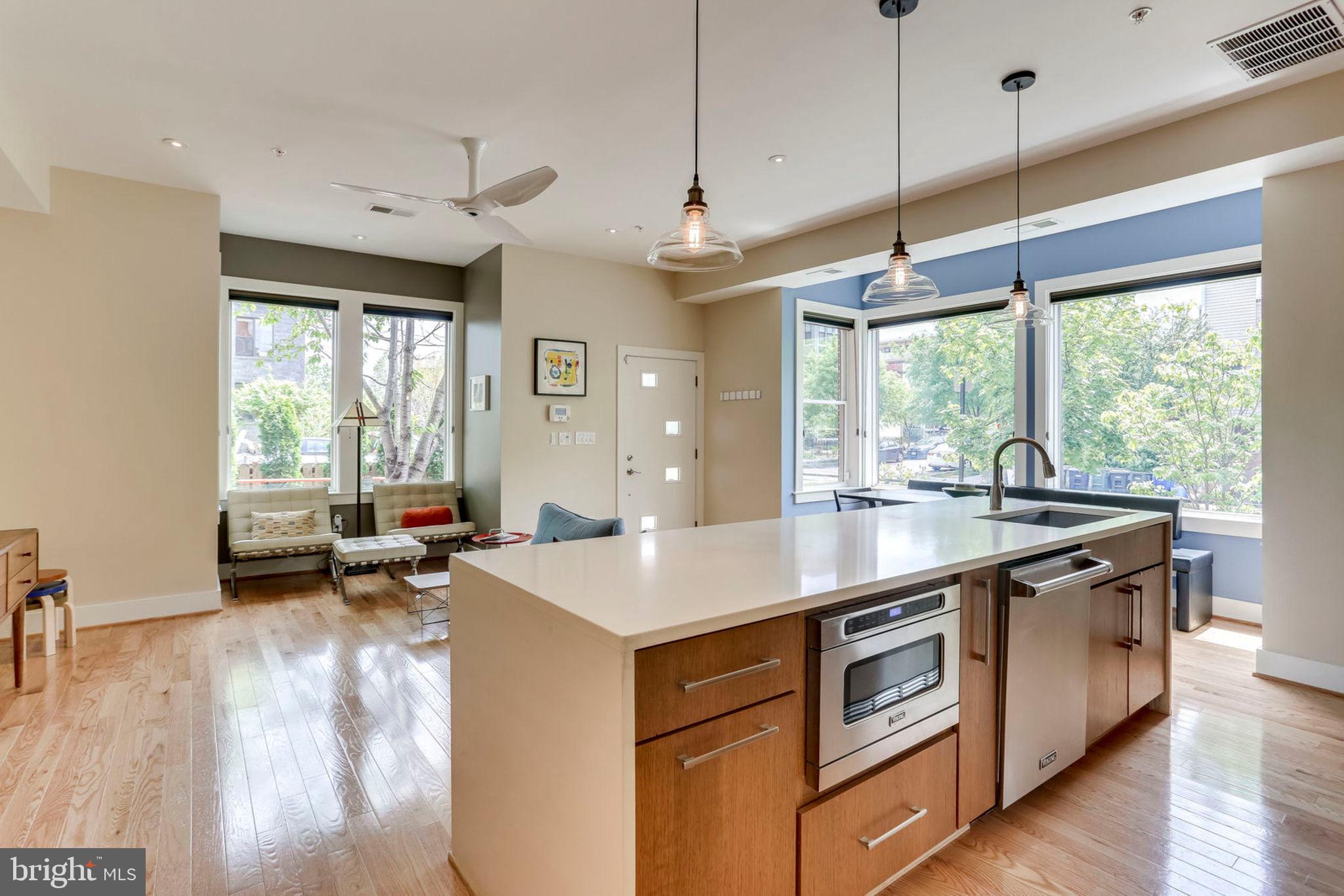 963 14th Street Southeast, Unit 1 Washington, DC 20003 - Photo 32 of 83 Kitchen island with custom cabinets.