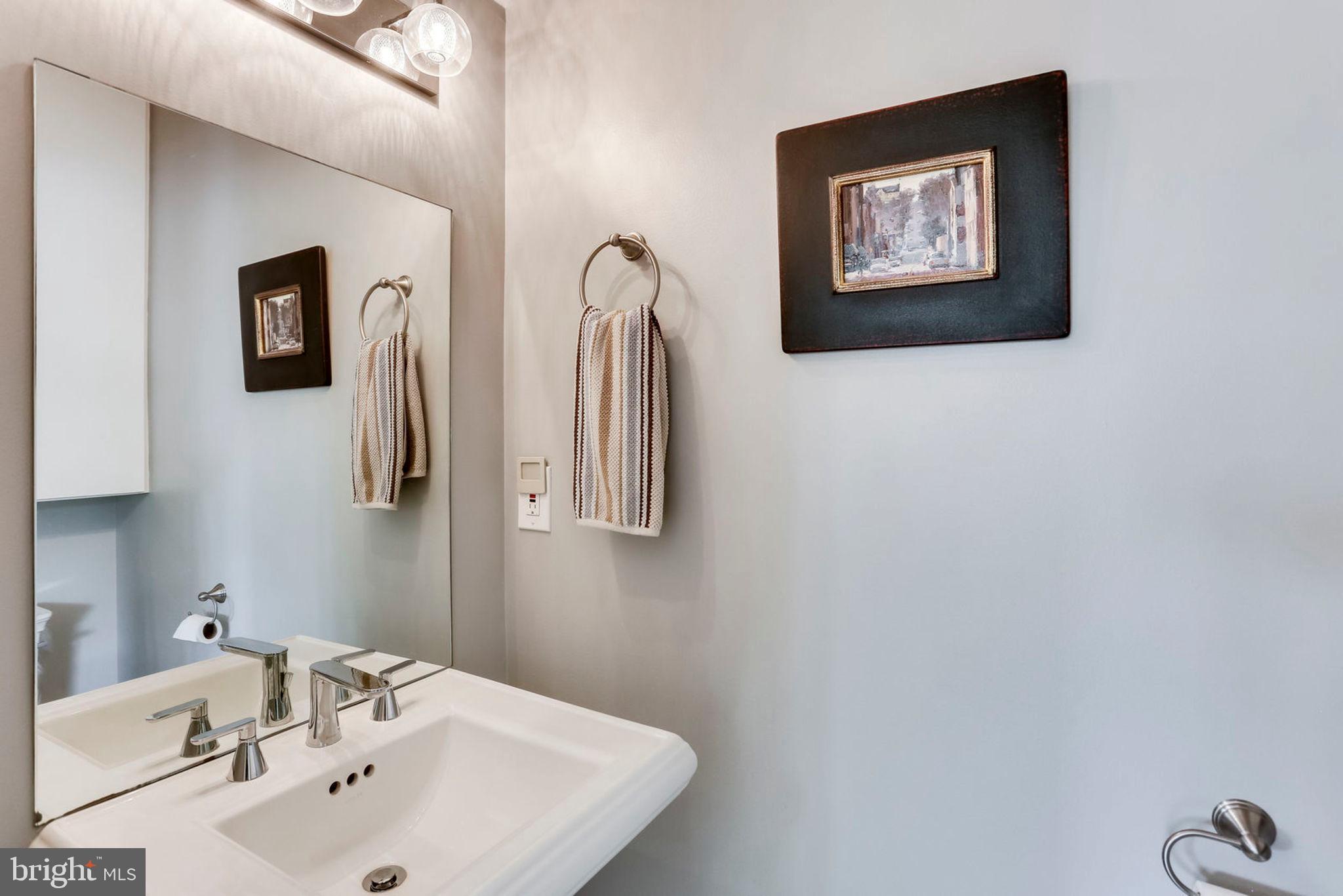 963 14th Street Southeast, Unit 1 Washington, DC 20003 - Photo 34 of 83 Half bath main level