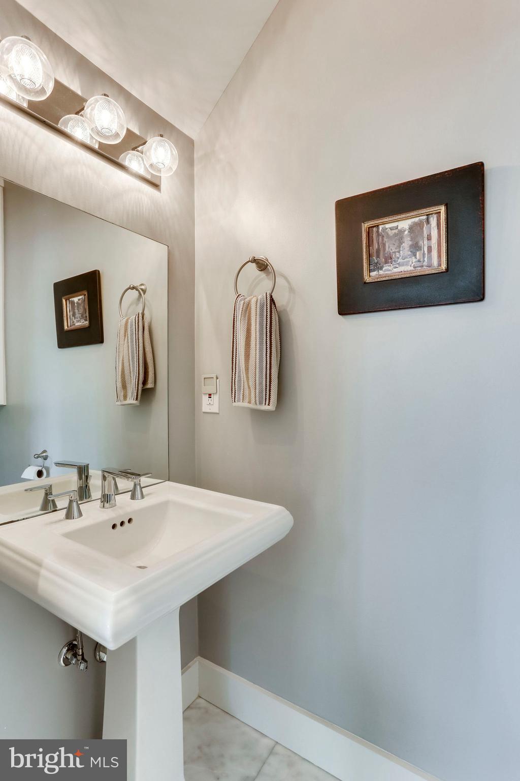 963 14th Street Southeast, Unit 1 Washington, DC 20003 - Photo 35 of 83 Half bath main level