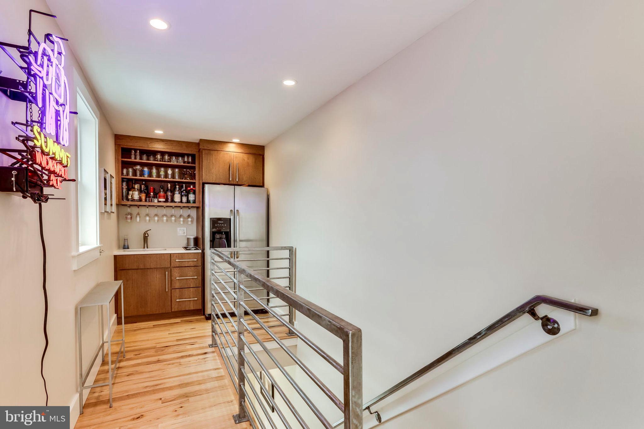 963 14th Street Southeast, Unit 1 Washington, DC 20003 - Photo 62 of 83 Wet bar with full refrigerator