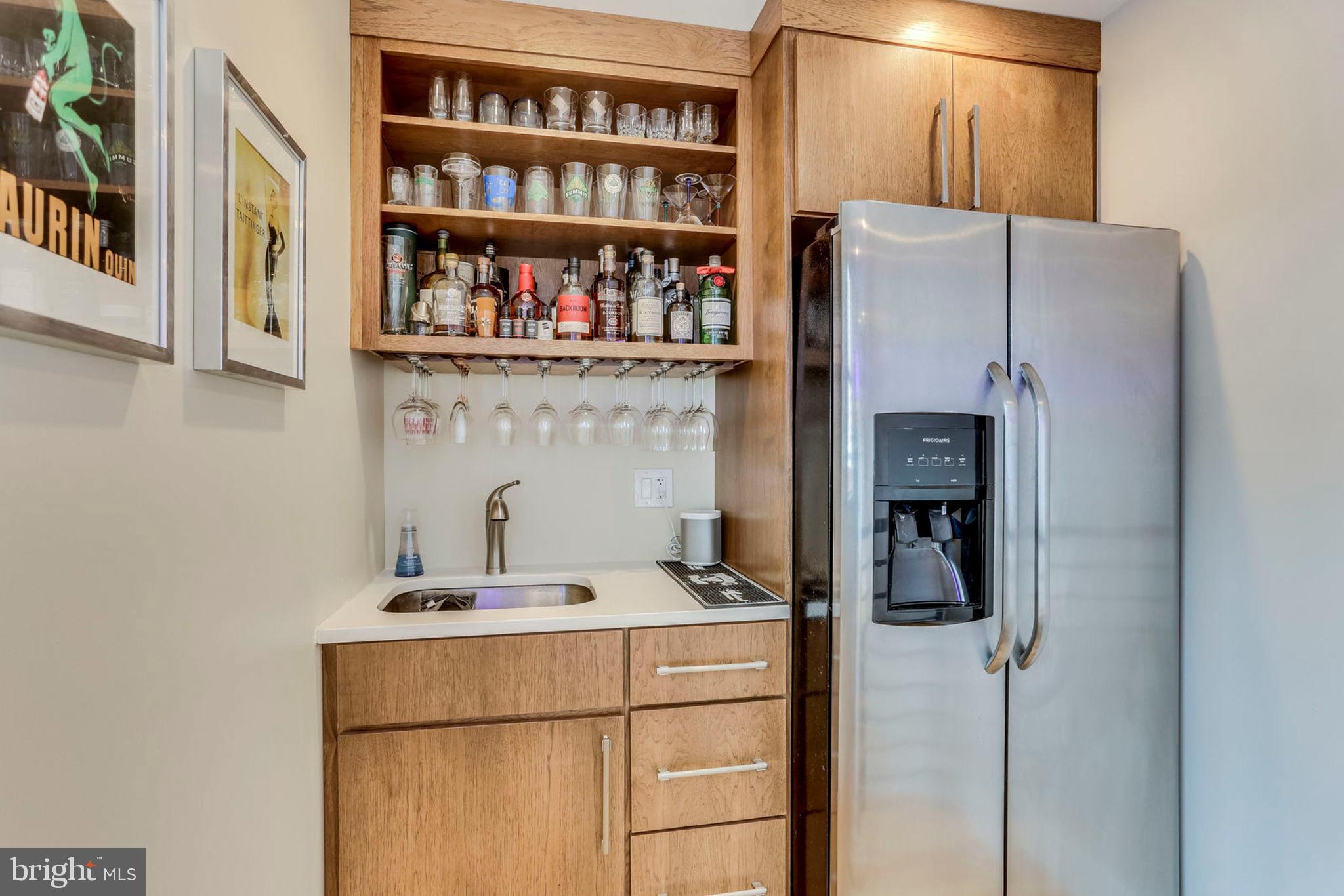 963 14th Street Southeast, Unit 1 Washington, DC 20003 - Photo 63 of 83 Wet bar with full refrigerator