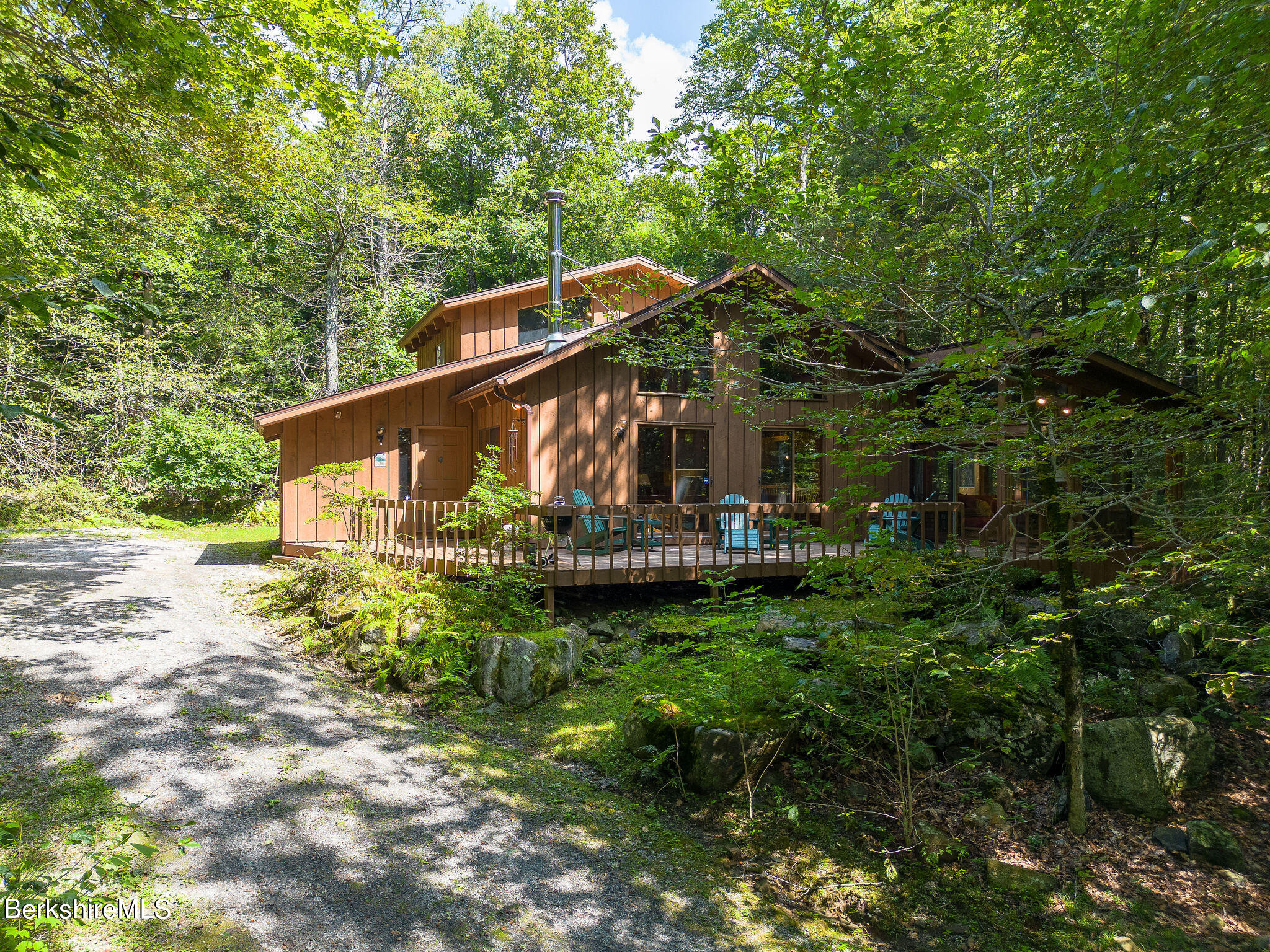 266 Moberg Road Becket, MA 01223 - Photo 33 of 41 a view of a house with backyard
