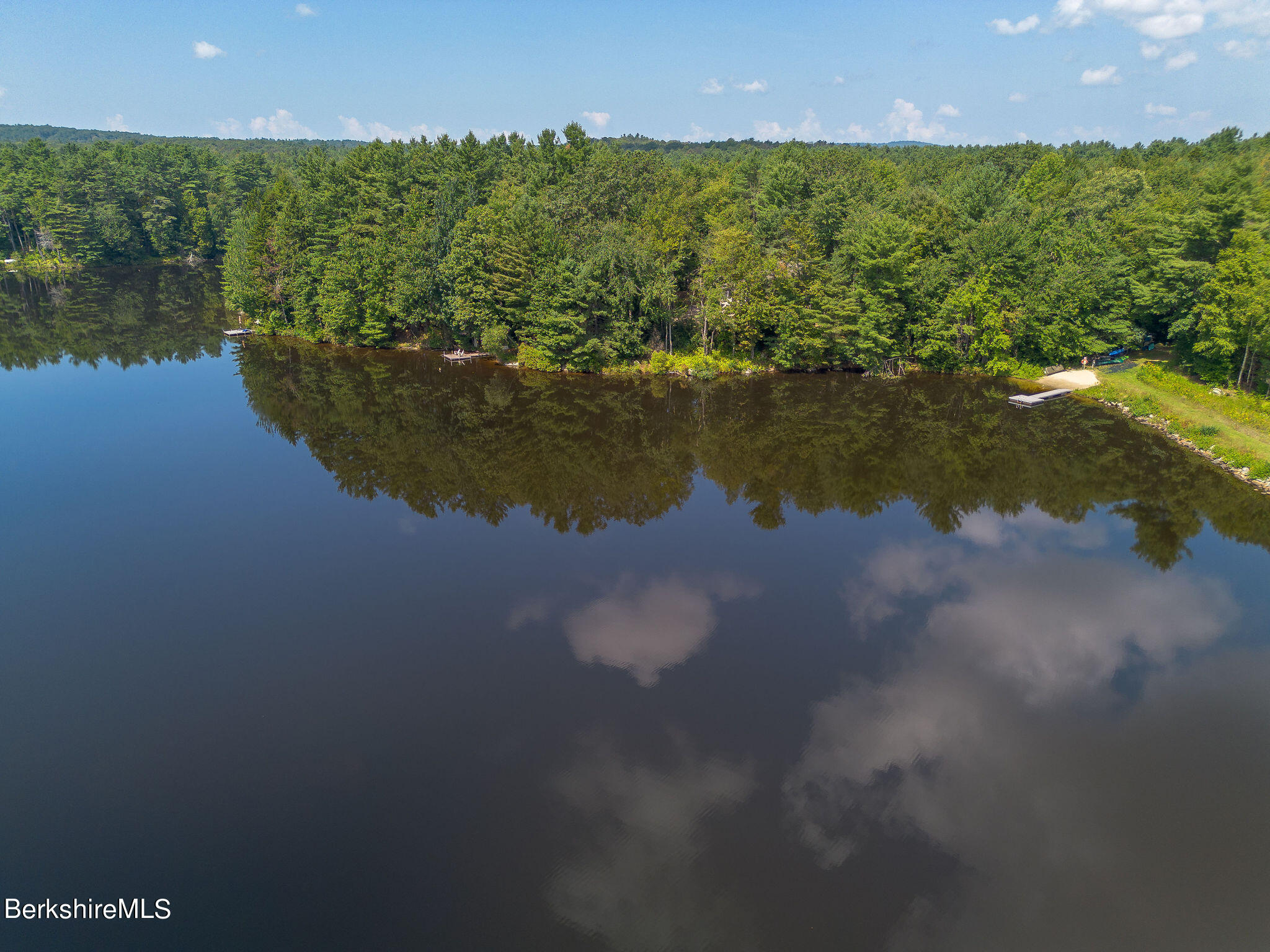 266 Moberg Road Becket, MA 01223 - Photo 38 of 41 a view of a lake from a yard