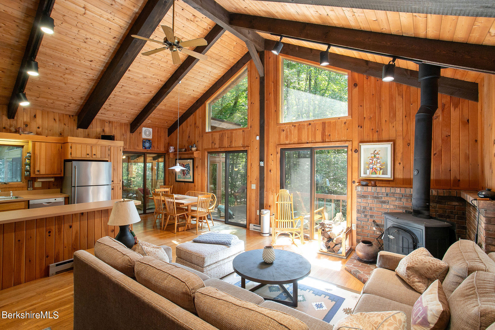 266 Moberg Road Becket, MA 01223 - Photo 4 of 41 a living room with furniture and a large window