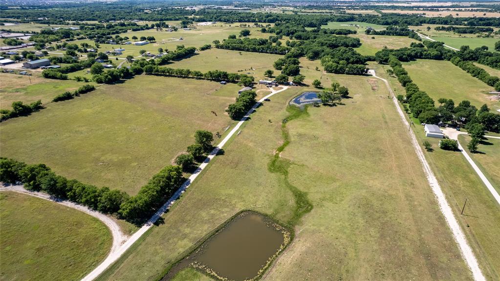 Tbd Eakin Cemetery Road Justin, TX 76247 - Photo 1 of 1 an aerial view of residential houses with outdoor space