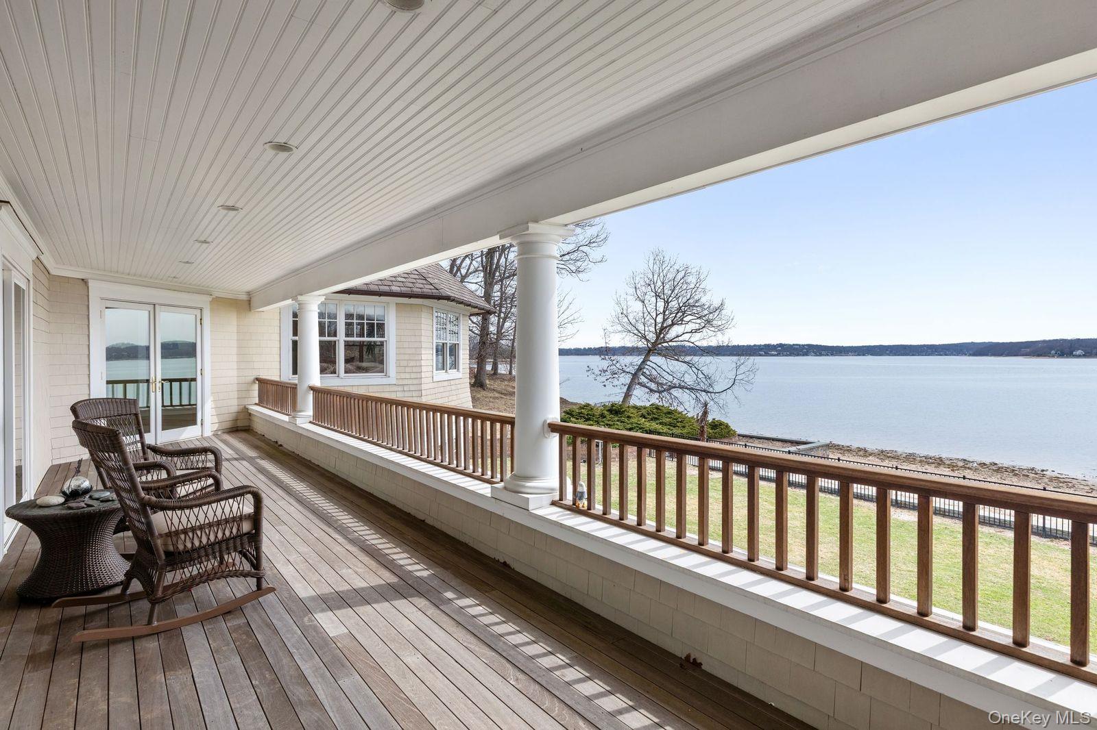 33 Beach Road Northport, NY 11768 - Photo 36 of 50 a view of a house with wooden deck