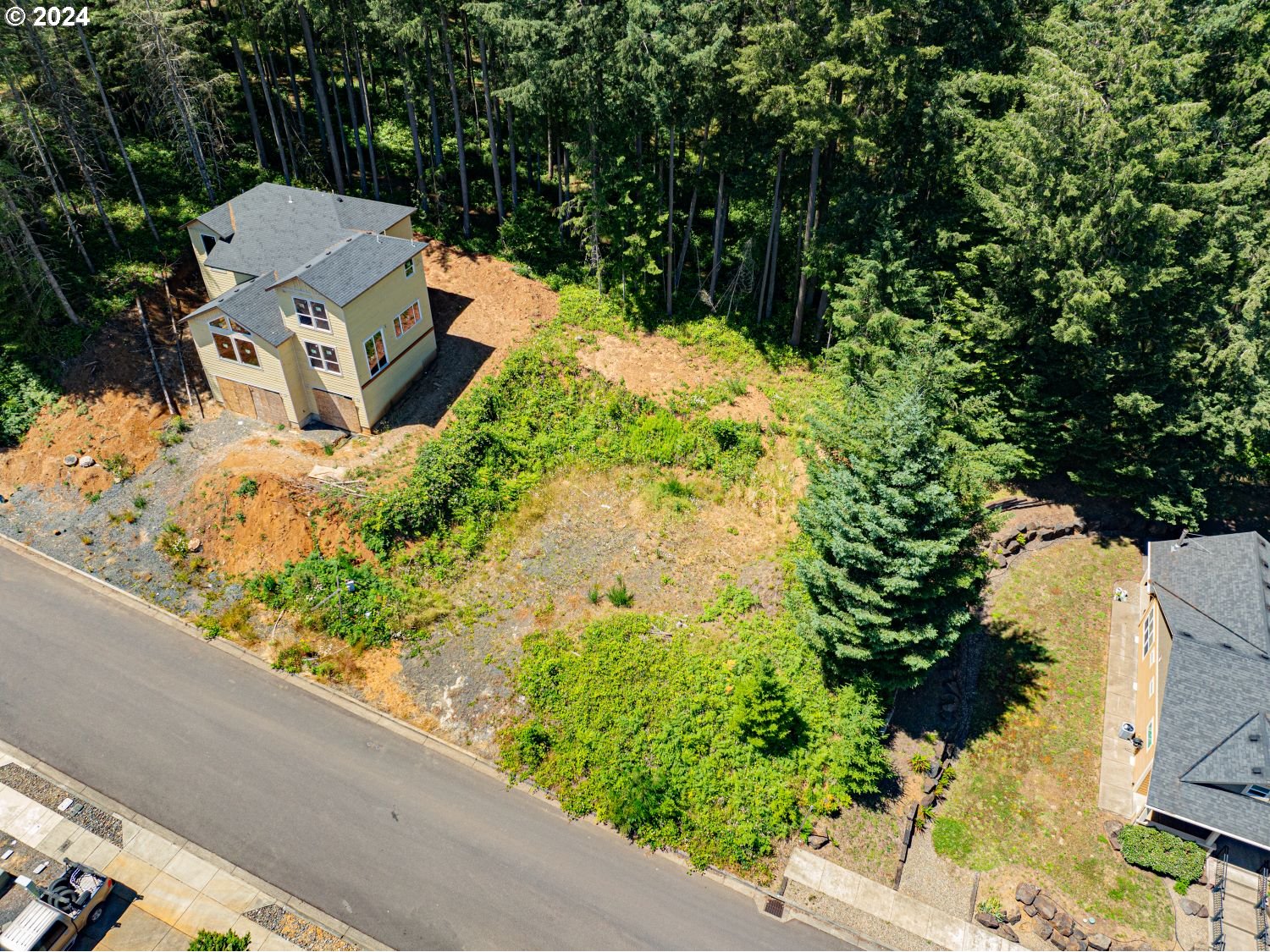 360 Boulder Ridge Drive Sweet Home, OR 97386 - Photo 5 of 7 an aerial view of a house with a yard and garden