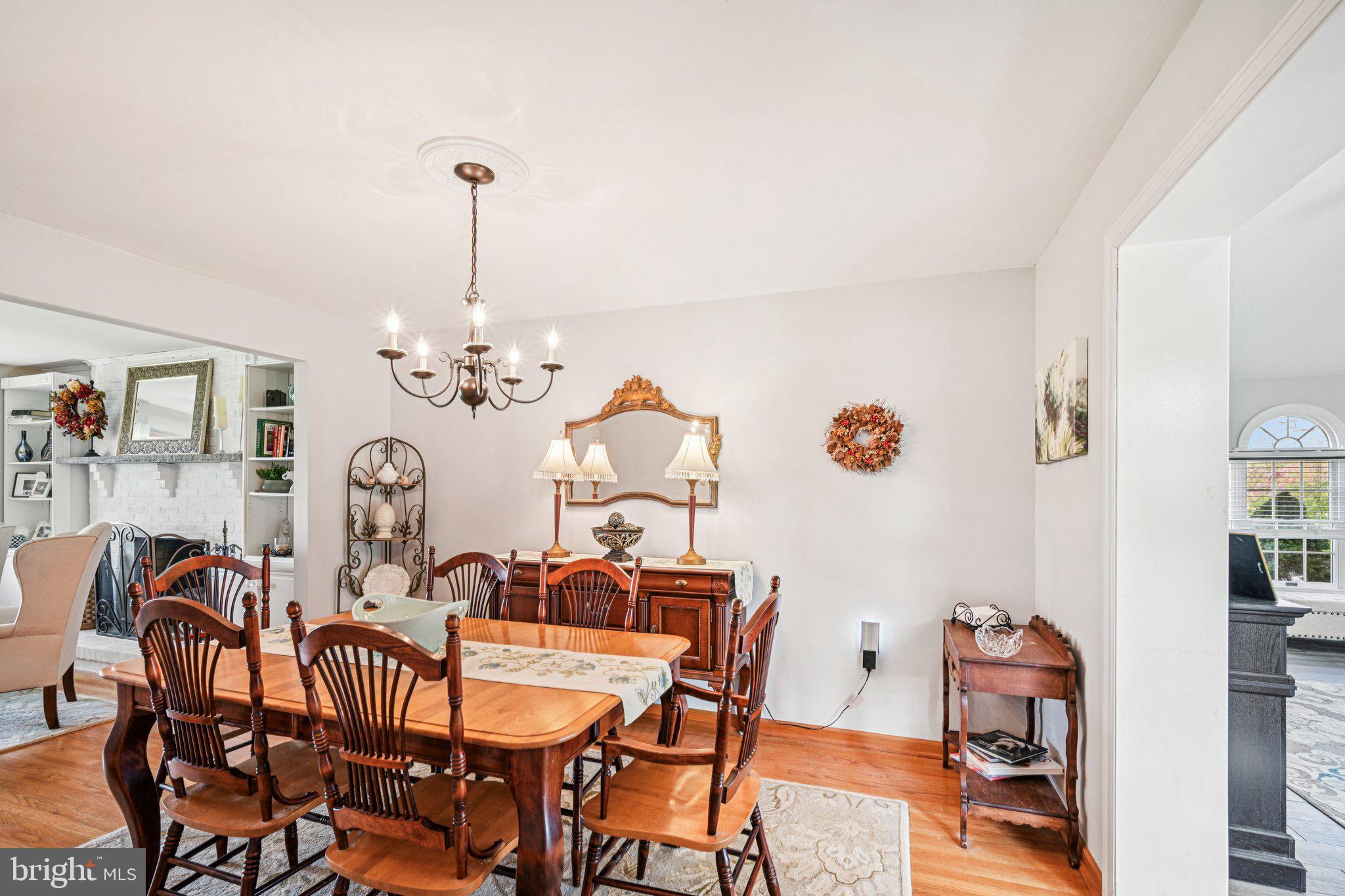 25618 Mt Pleasant Road Columbus, NJ 08022 - Photo 15 of 61 a view of a dining room with furniture and chandelier