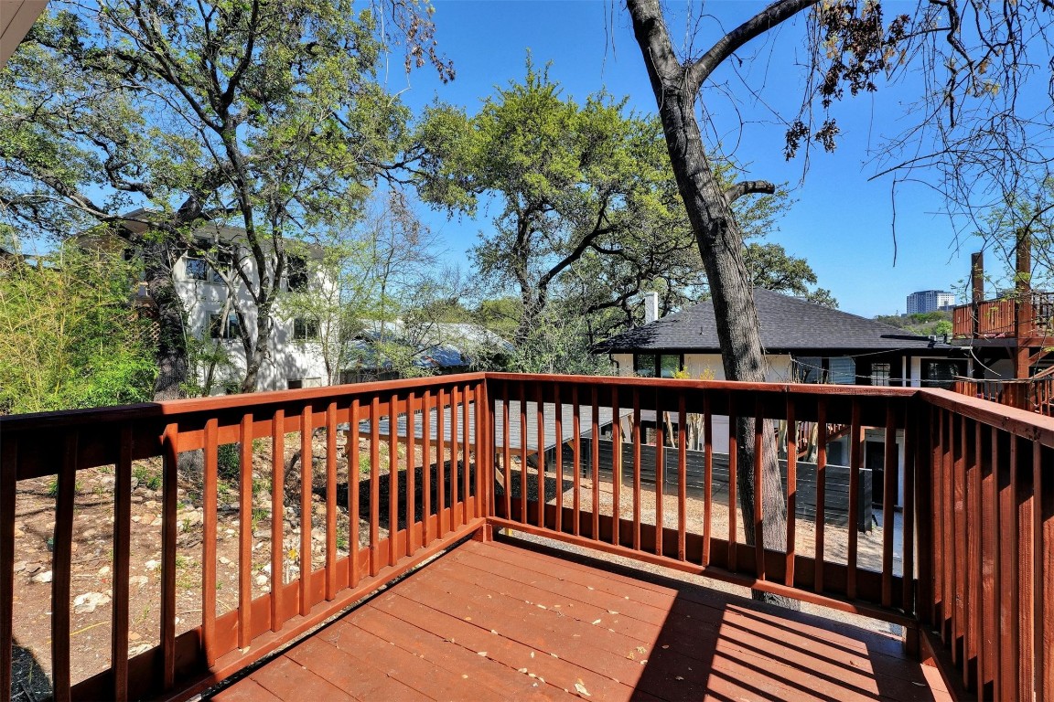 1401 Windsor Road Austin, TX 78703 - Photo 20 of 20 a balcony with wooden floor and fence