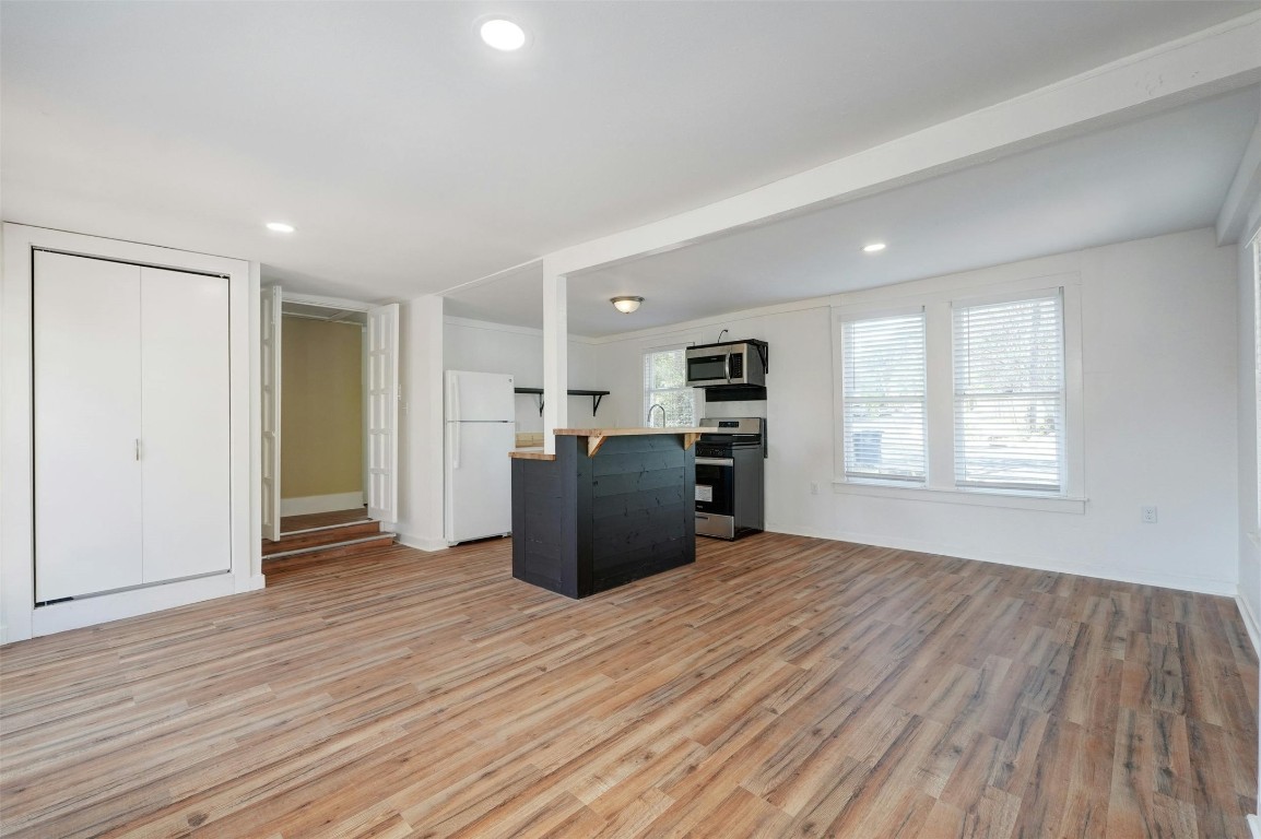 1401 Windsor Road Austin, TX 78703 - Photo 7 of 20 a view of a kitchen with wooden floor