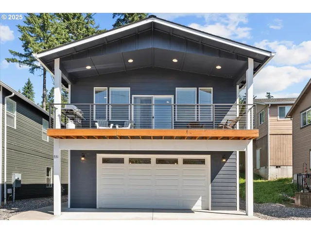 a view of house with swimming pool