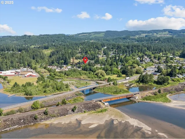 a view of a town with mountains in the background
