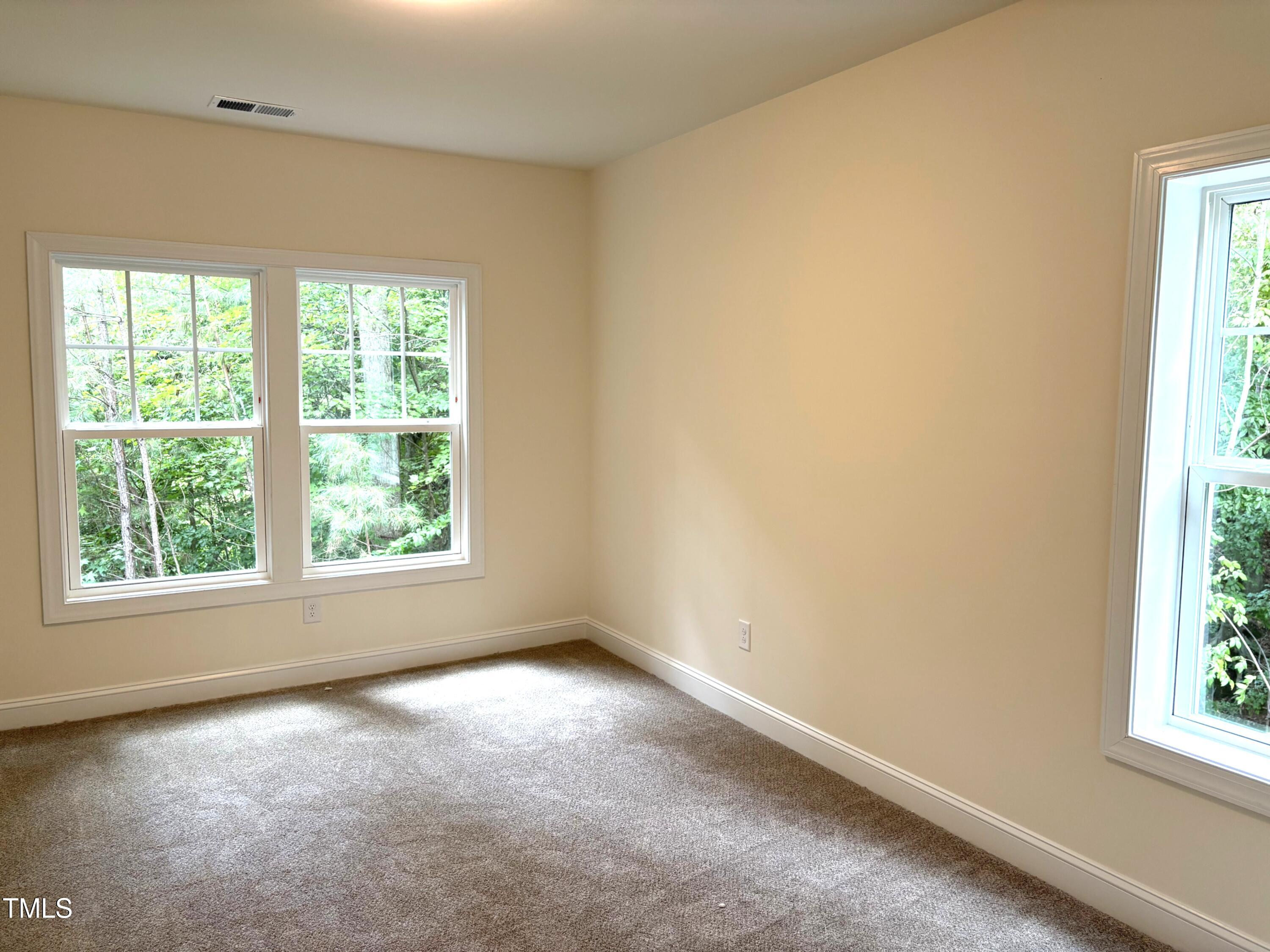 617 Weather Ridge Lane, Unit 32 Cary, NC 27513 - Photo 7 of 18 Primary Bedroom