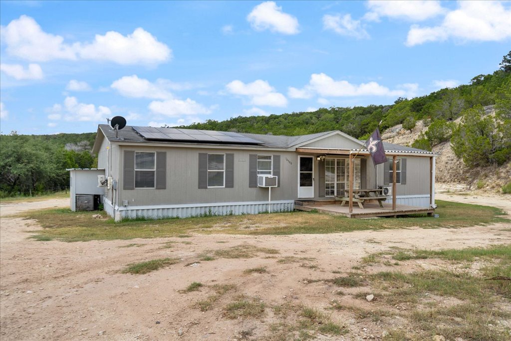 10500 Tarantula Court Leander, TX 78641 - Photo 2 of 34 a view of house with outdoor space and swimming pool