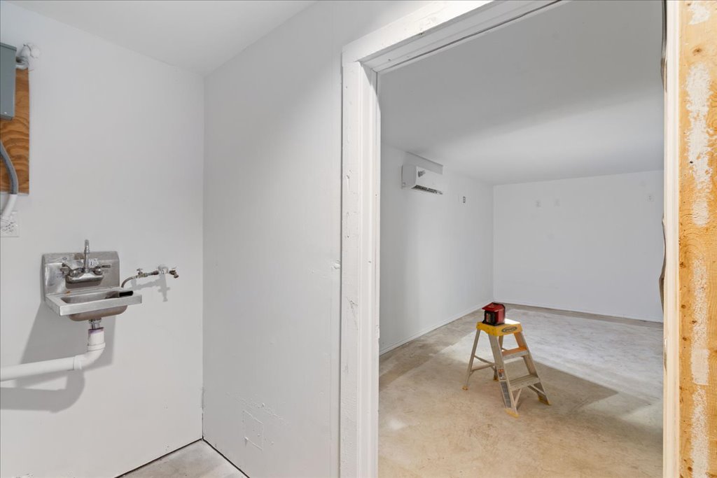 10500 Tarantula Court Leander, TX 78641 - Photo 23 of 34 a view of a room with a sink and a mirror
