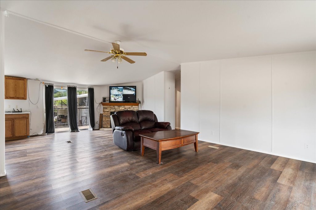 10500 Tarantula Court Leander, TX 78641 - Photo 4 of 34 a living room with furniture and wooden floor