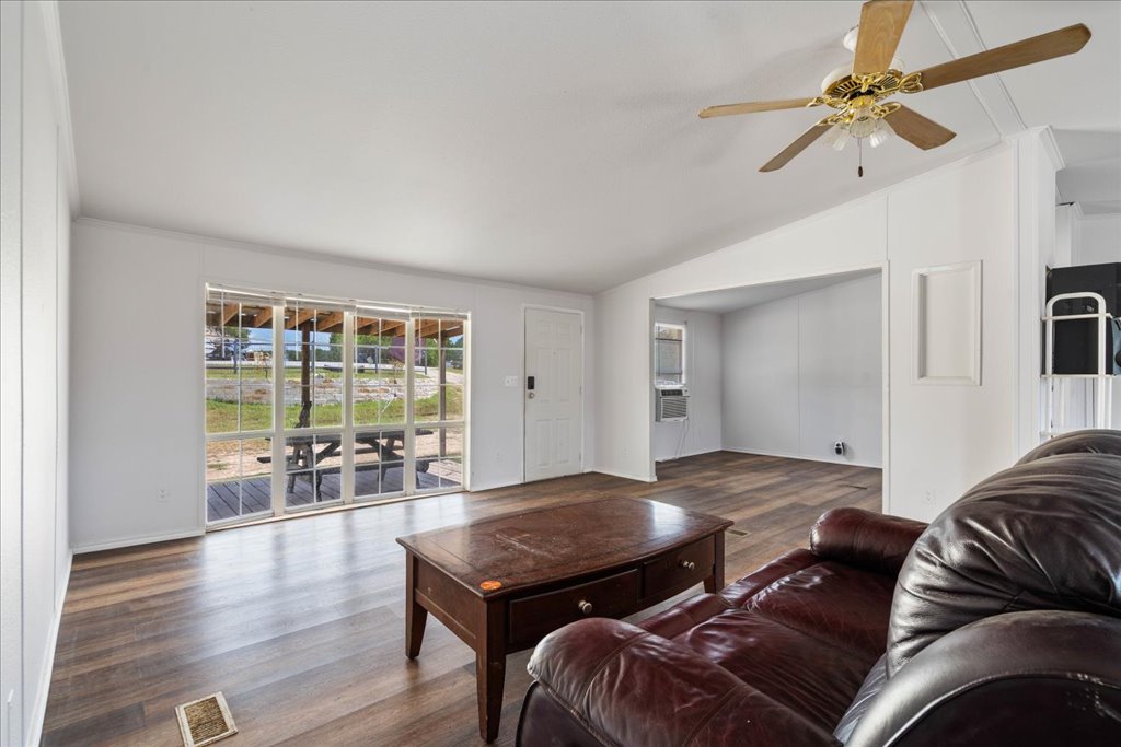 10500 Tarantula Court Leander, TX 78641 - Photo 5 of 34 a living room with furniture and a window