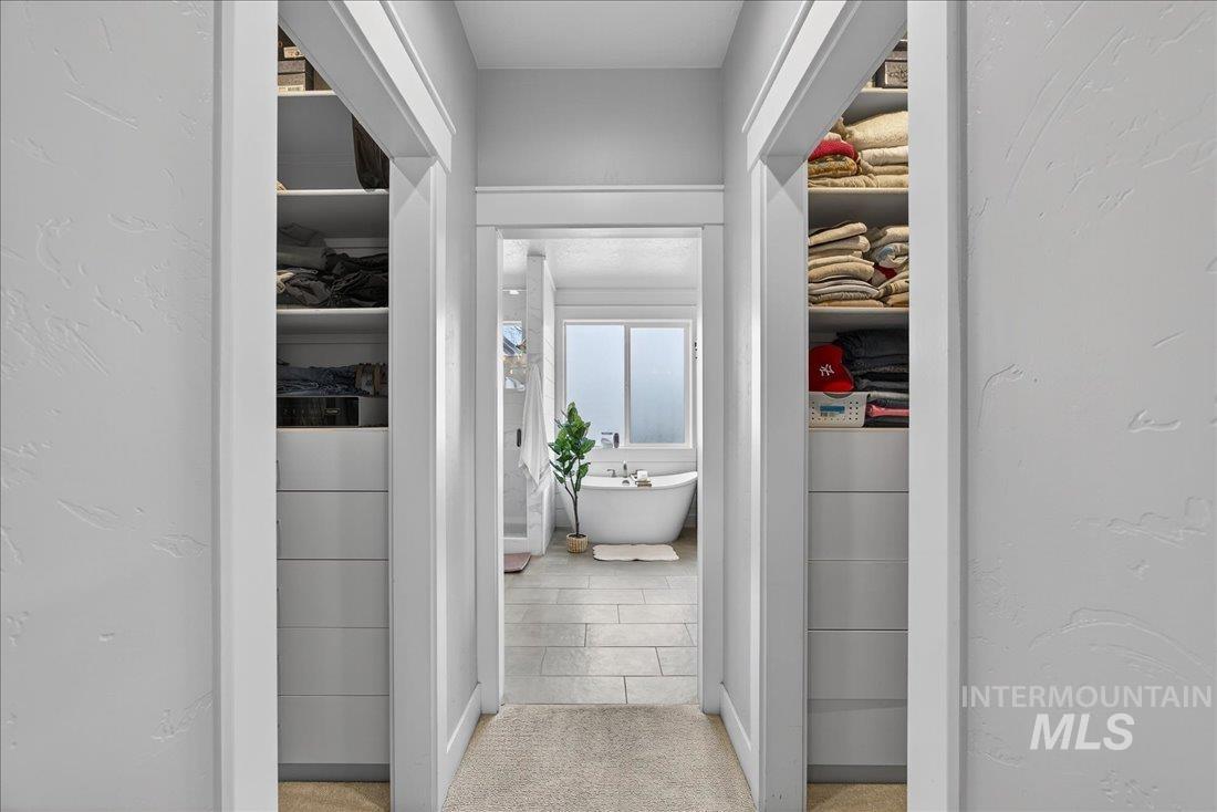 15111 Pinehurst Way Caldwell, ID 83607 - Photo 15 of 43 Hallway with a textured wall