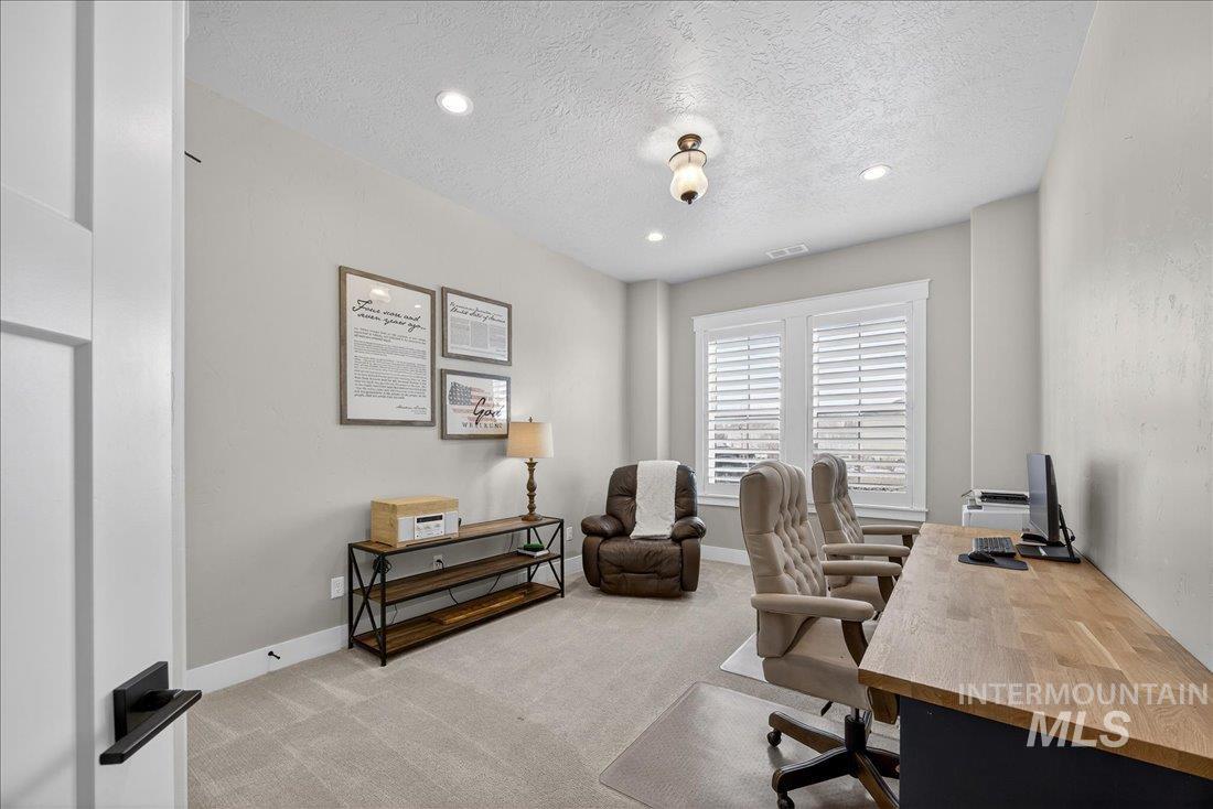 15111 Pinehurst Way Caldwell, ID 83607 - Photo 19 of 43 Office space featuring light colored carpet, a textured ceiling, and recessed lighting