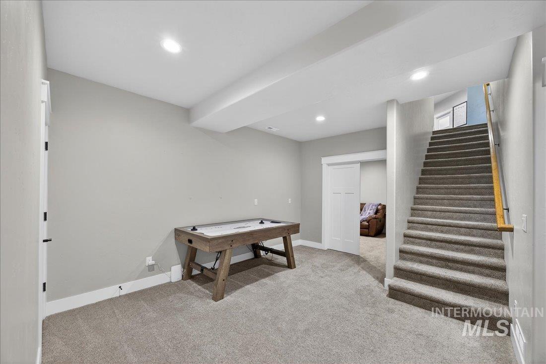 15111 Pinehurst Way Caldwell, ID 83607 - Photo 22 of 43 Recreation room with light carpet and recessed lighting