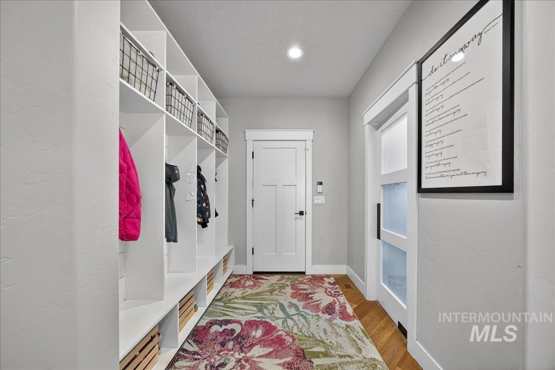 15111 Pinehurst Way Caldwell, ID 83607 - Photo 32 of 43 Mudroom with wood finished floors, a textured wall, and recessed lighting