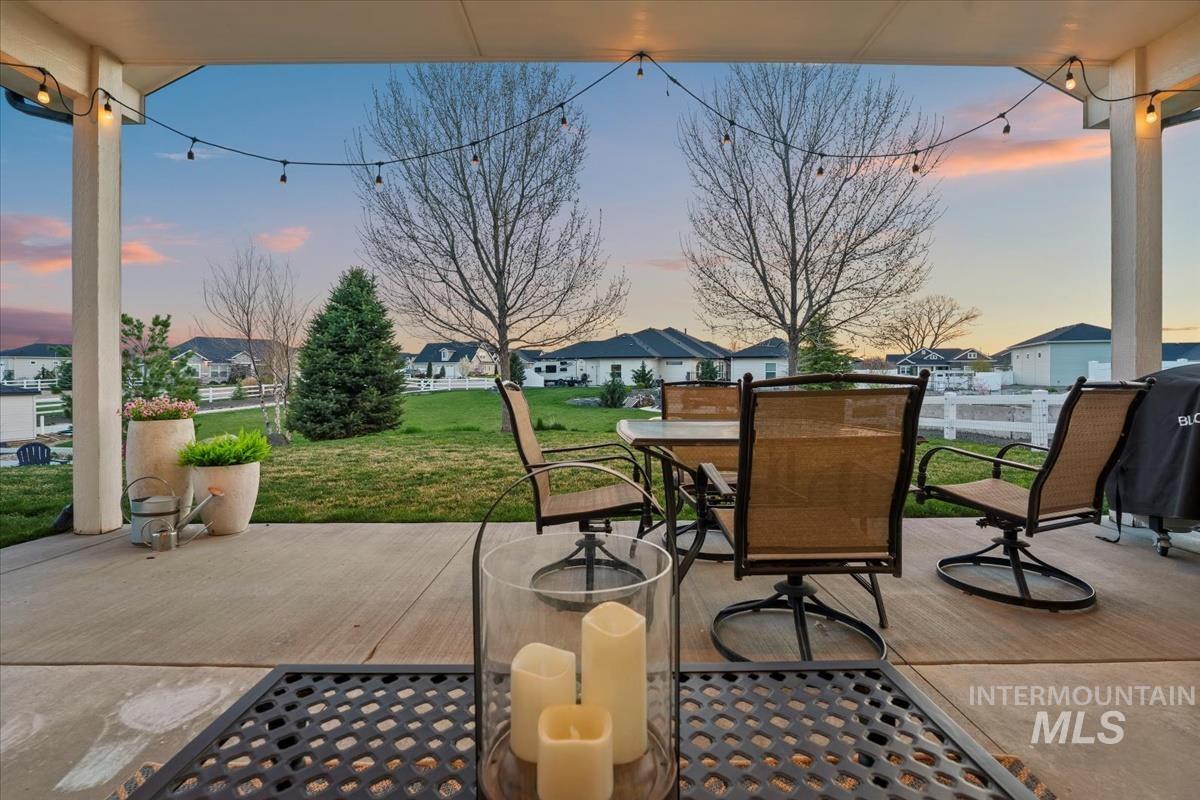 15111 Pinehurst Way Caldwell, ID 83607 - Photo 35 of 43 View of patio / terrace with a residential view and outdoor dining area