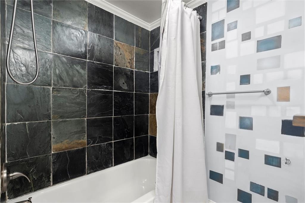 153 Randolph Street Northeast, Unit B Atlanta, GA 30312 - Photo 17 of 22 a bathroom with a shower